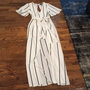 Brand new high/low romper.